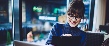 a lady smiling and working